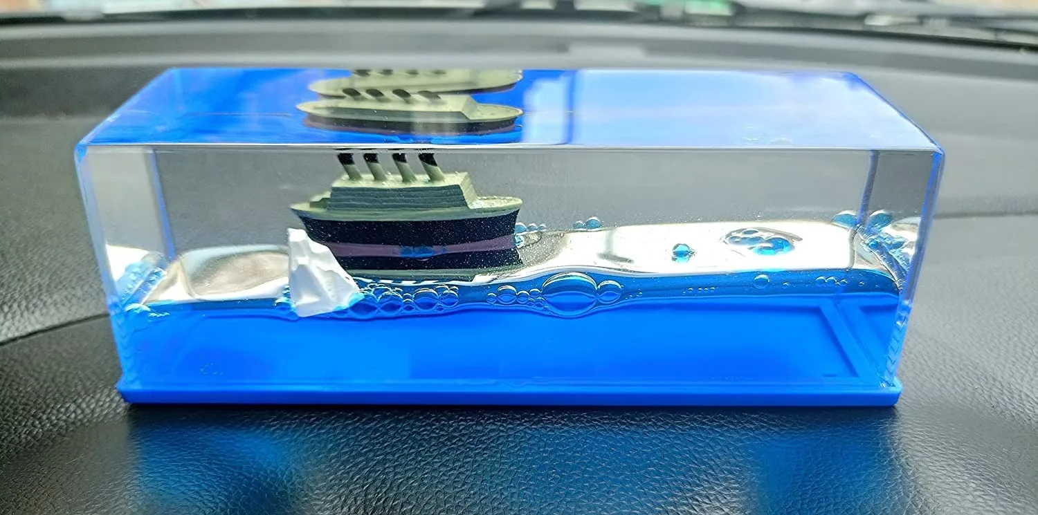 BZ19 Liquid Wave Cruise Ship Decoration - Unsinkable Titanic Model in a Clear Liquid Motion Bottle for Stress Relief, Office or Home Desk Decor, Gift and Paperweight - Soothing Blue Liquid with Floating Ship Design